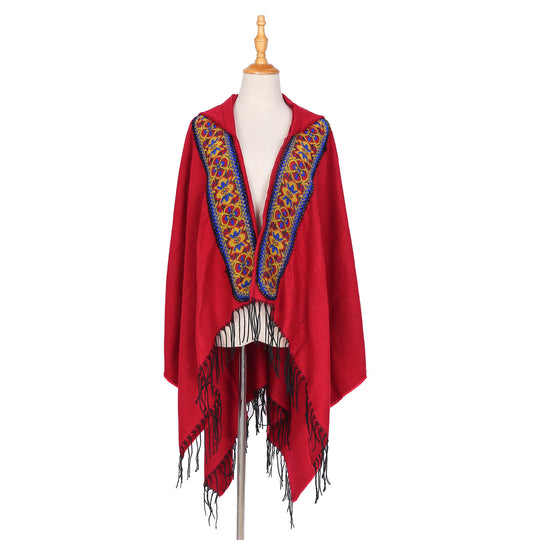 Damen Kapuzenponcho aus Wollmix mit kontrastreicher Blumenstickerei und Fransensaum Shop Nory