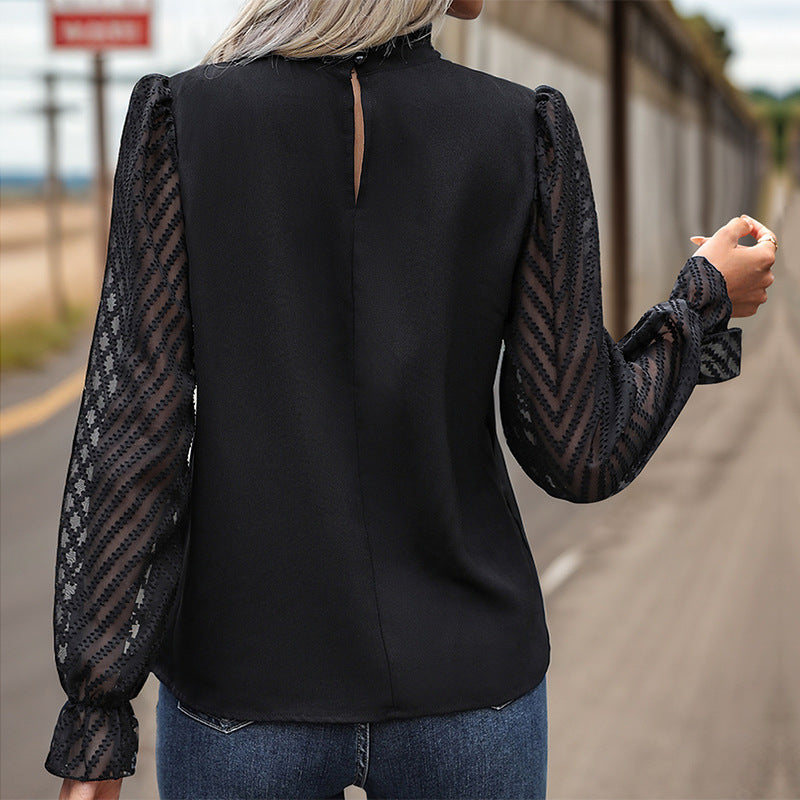 Damen Bluse mit eleganten transparenten Ärmel und Knopfdetails