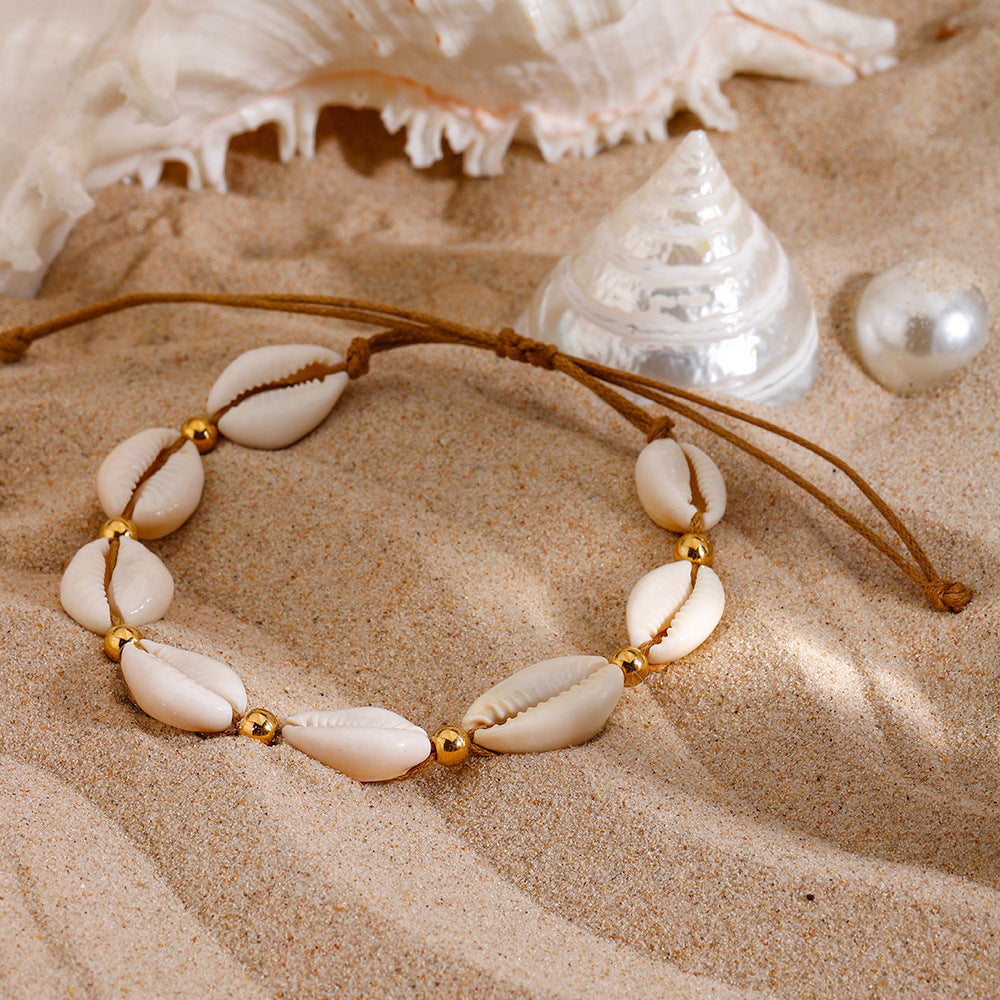 Damen Armband mit Muschel- und goldenen Akzenten Shop Nory