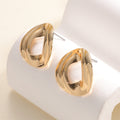 Damen Ohrringe mit modernem, skulpturalem Design Shop Nory