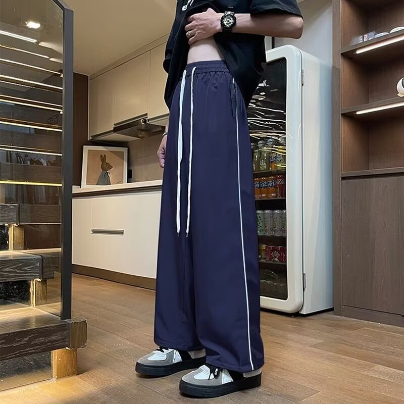 Herren Sportliche Lockere Jogginghose mit kontrastierenden Seiteneinsätzen Shop Nory