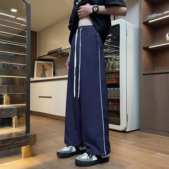 Herren Sportliche Lockere Jogginghose mit kontrastierenden Seiteneinsätzen Shop Nory