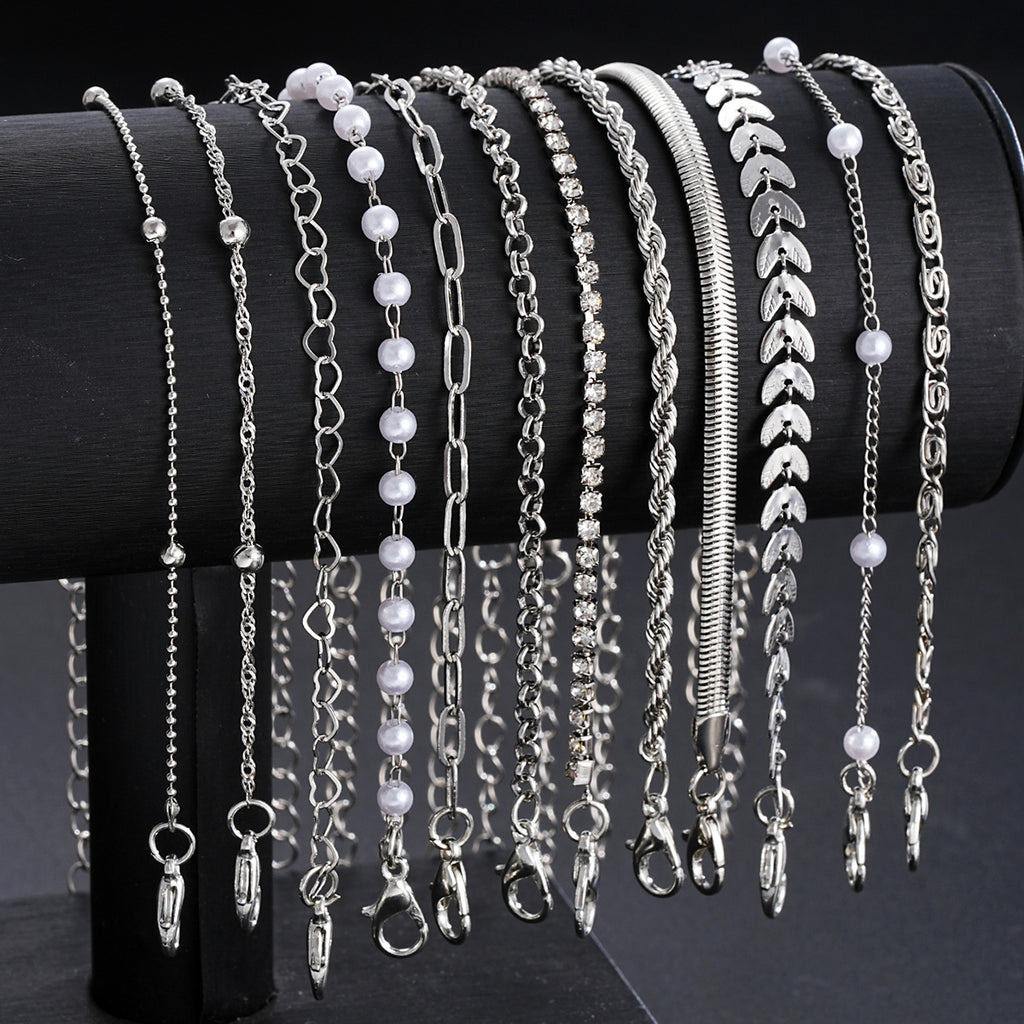 Damen Armband-Set mit filigranen Designs und funkelnden Zirkonia Shop Nory
