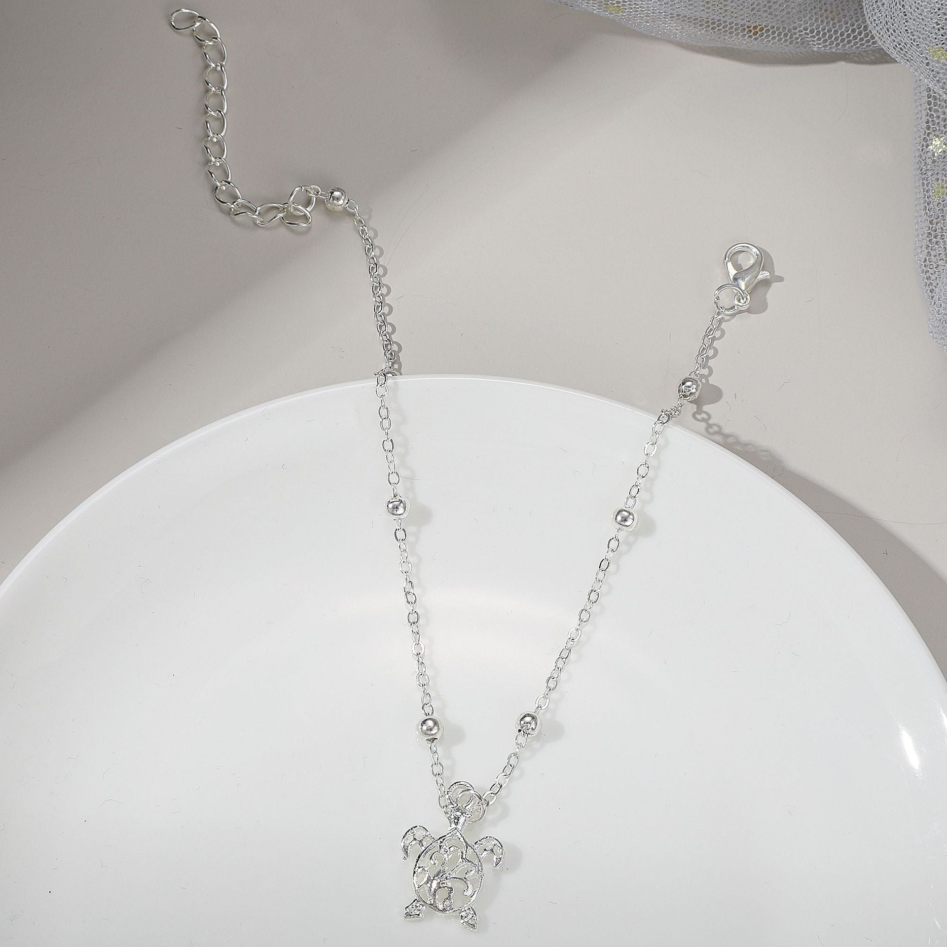 Damen Fußkettchen mit filigranem Schildkrötenanhänger Shop Nory