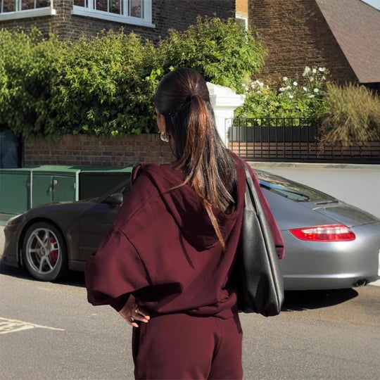 Damen gekürztes Kapuzen-Sweatshirt mit Oversize-Ärmeln und high-waist Wide-Leg Freizeithose Shop Nory