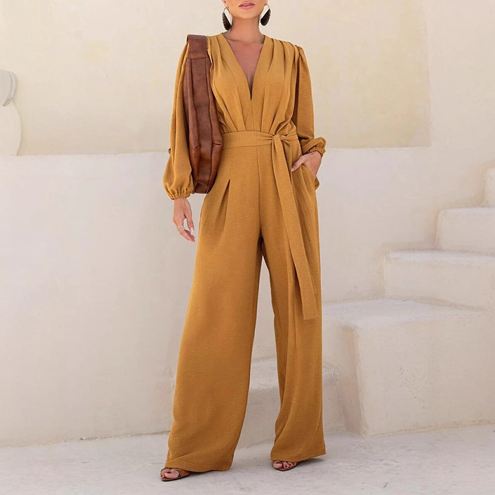 Damen Eleganter Palazzo-Jumpsuit mit tiefem V‑Ausschnitt, Bindegürtel und Ballonärmeln Shop Nory