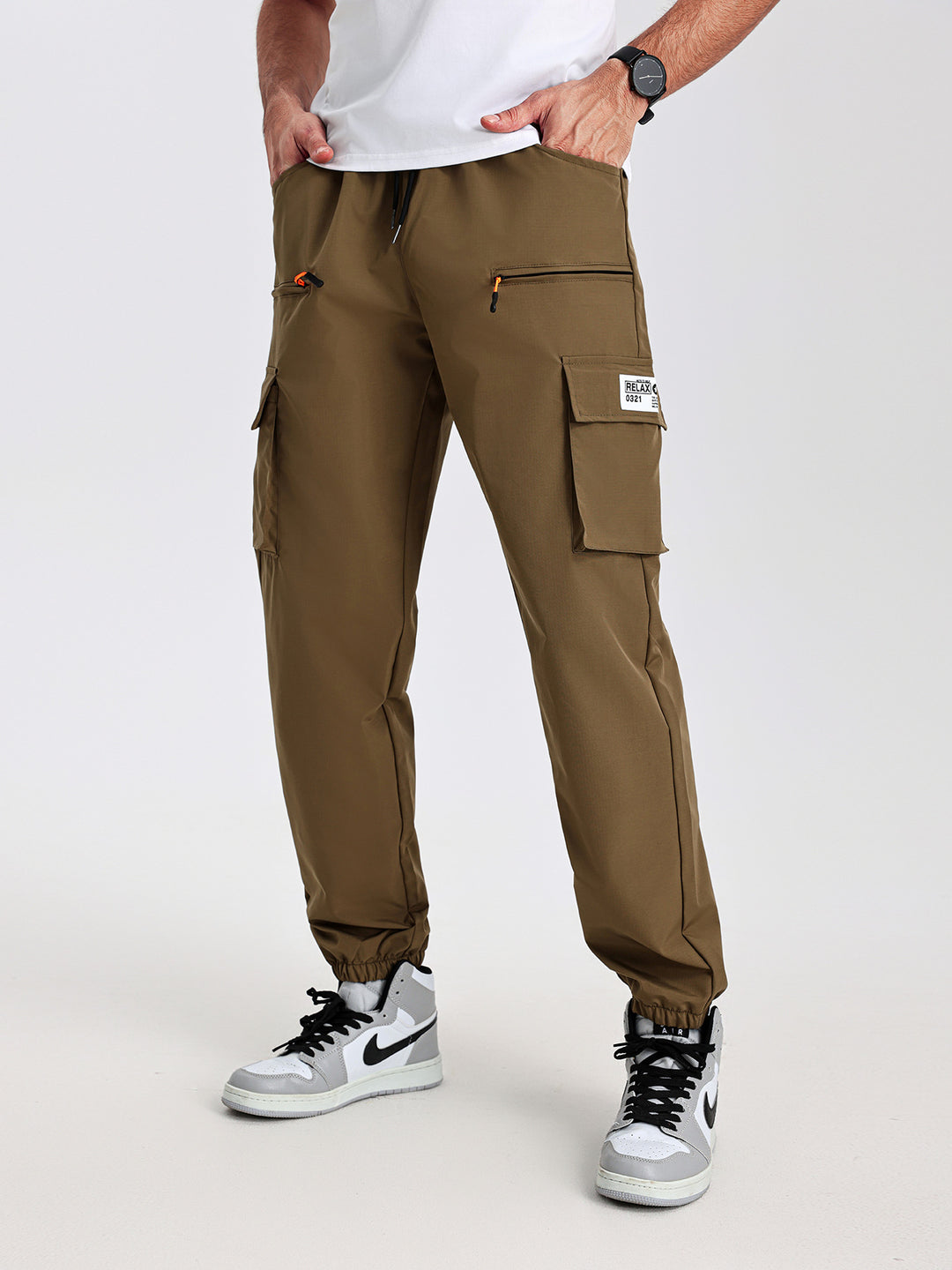 Herren konisch geschnittene Utility-Cargohose im Joggerstil mit Tunnelzugbund, Reißverschlusstaschen & elastischen Beinabschlüssen Shop Nory