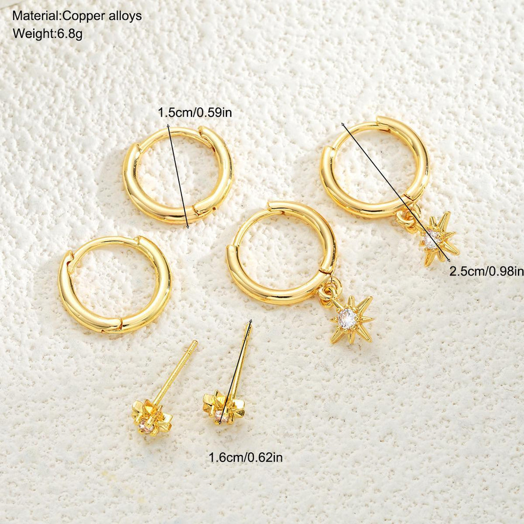 Damen Ohrschmuck mit funkelndem Sternanhänger und eleganten Creolen Shop Nory