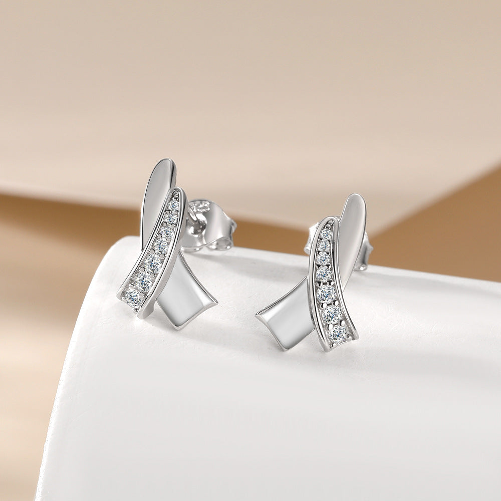 Damenohrringe mit elegantem gewundenem Design und funkelnden Zirkonia-Elementen Shop Nory