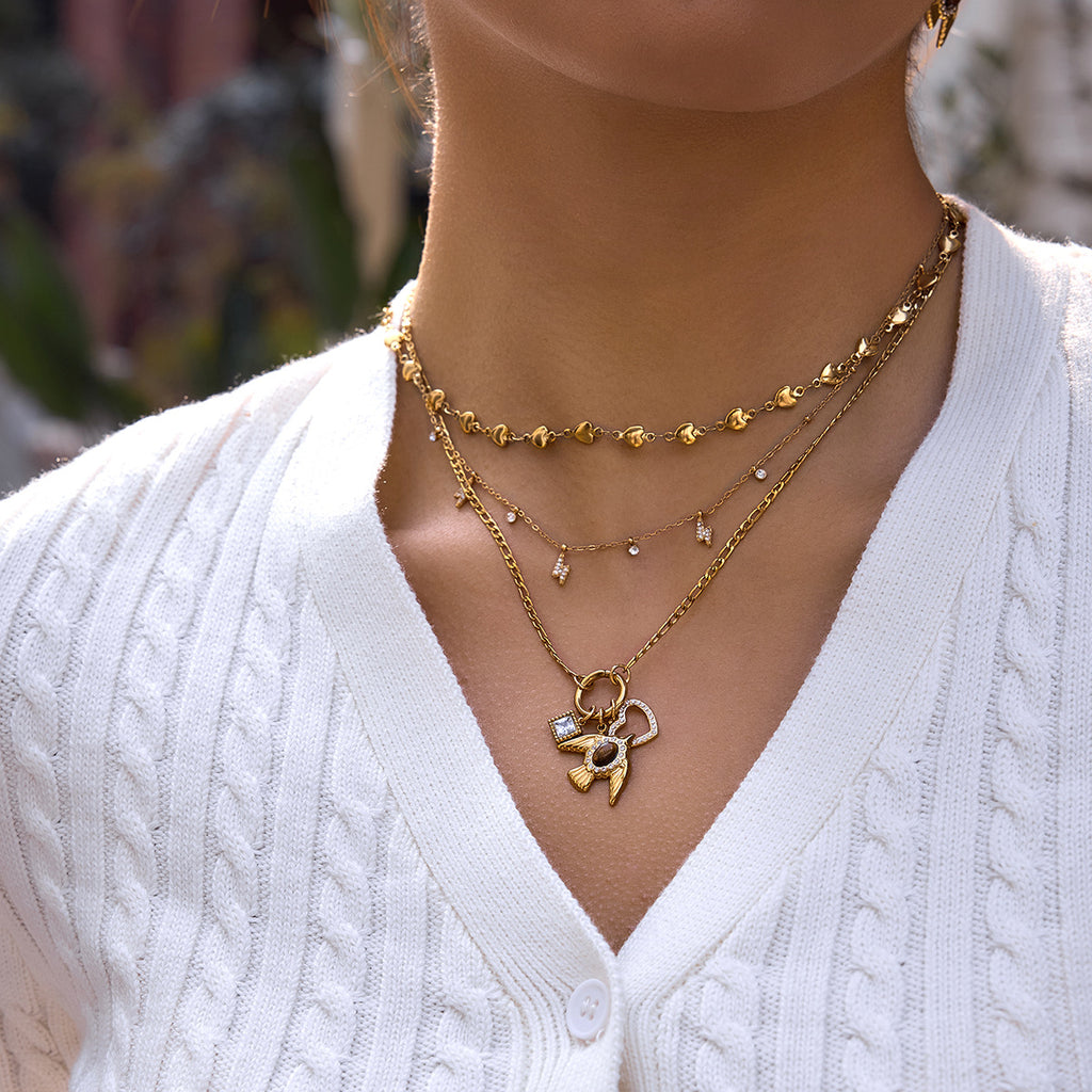 Damen Halskette mit einzigartigem Vogelanhänger und funkelnden Zirkonia-Details Shop Nory