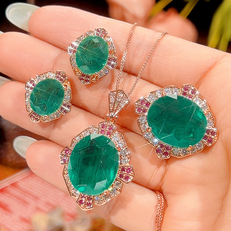 Vintage-inspirierte ovale Halo-Anhänger- und Ohrstecker-Set mit Pavé-Kubikzirkonia und rosévergoldeter Beschichtung