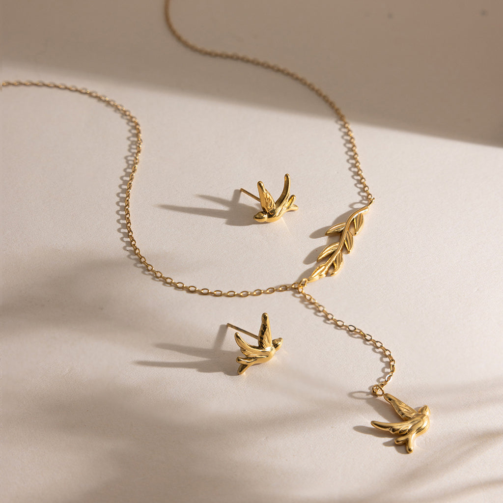 Damen Halskette mit Anhänger im eleganten Vogel-Design aus hypoallergenem Edelstahl Shop Nory