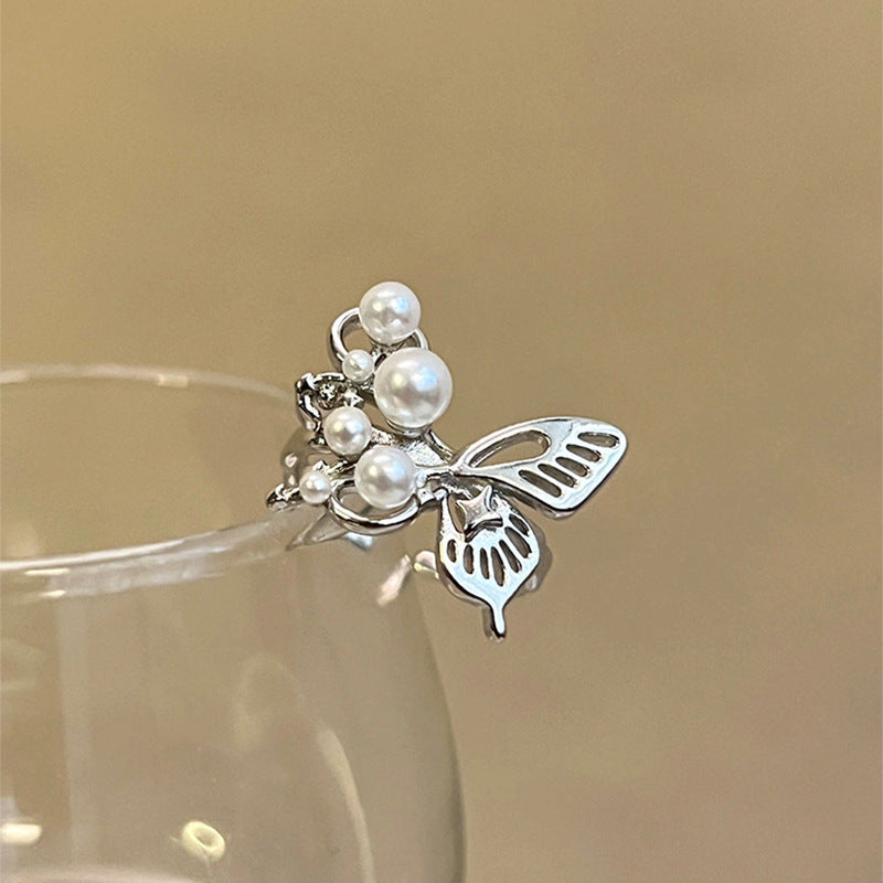 Damen eleganter Ring mit Schmetterlingsdesign und Perlen Shop Nory