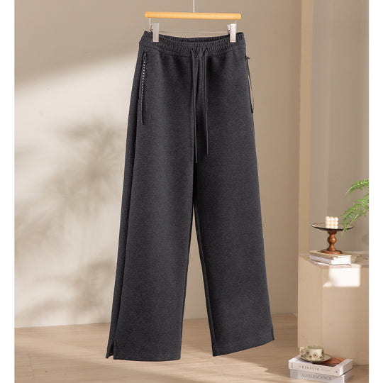 Damen weite French‑Terry Lounge-Sweatpant mit hohem Bund, Kordelzug und seitlichen Schlitzen Shop Nory