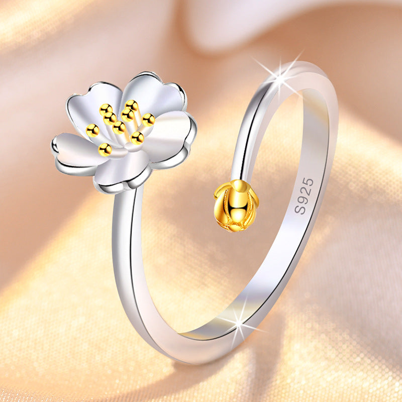 Damenring mit floralem Design und feiner Goldverzierung Shop Nory