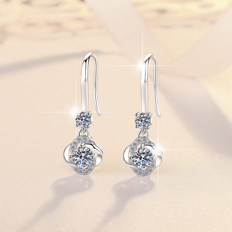 Damenohrringe mit funkelndem Zirkonia und elegantem Wellen-Design Shop Nory