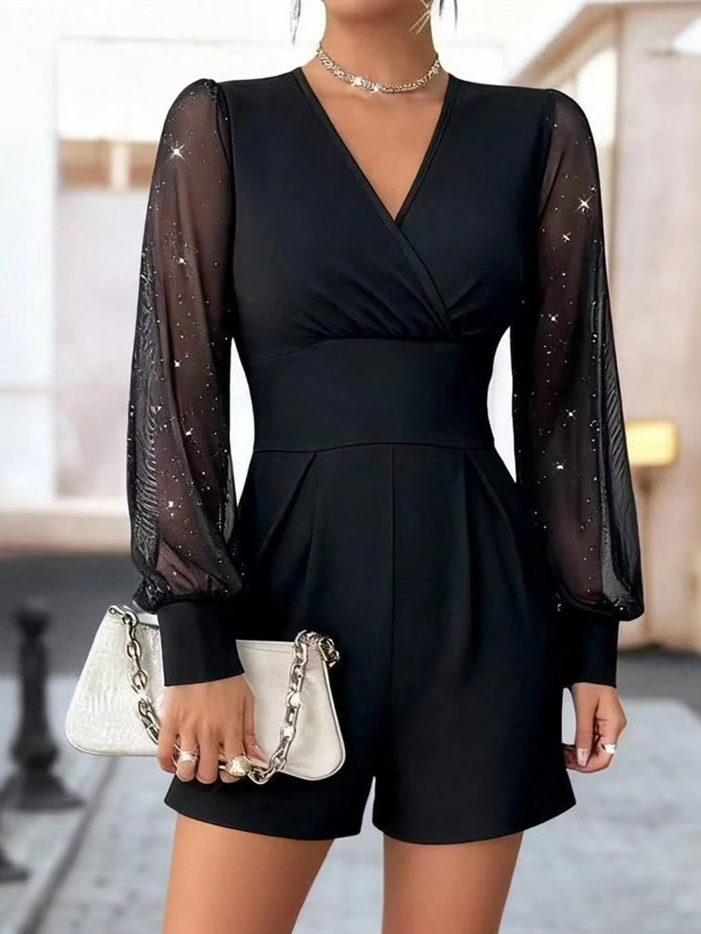 Damen eleganter Jumpsuit mit transparenten Puffärmeln und V-Ausschnitt