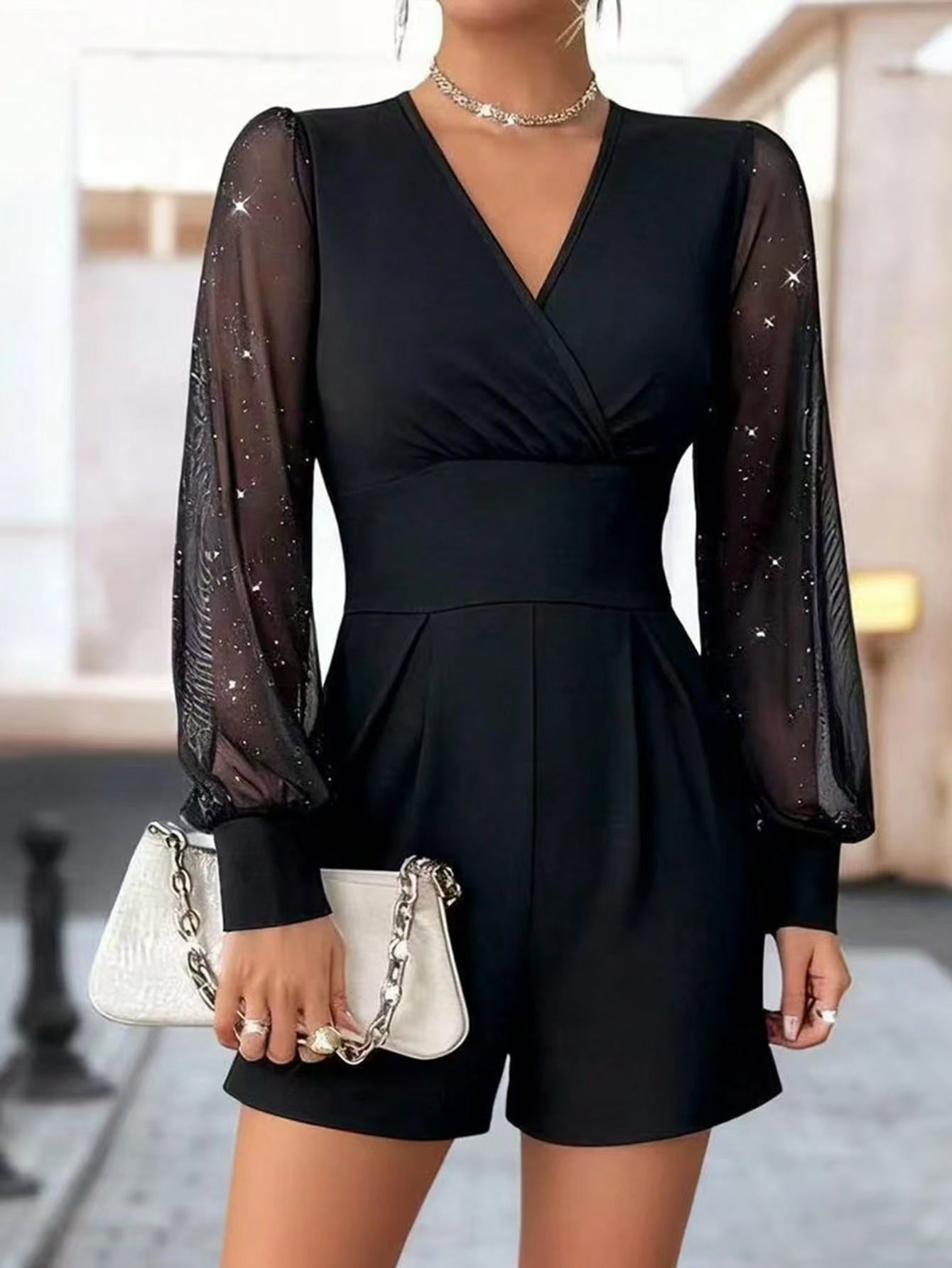 Damen eleganter Jumpsuit mit transparenten Puffärmeln und V-Ausschnitt