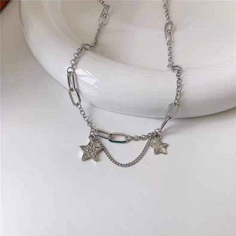 Damen Halskette mit verspielt funkelnden Sternen und modernem Gliederdesign Shop Nory