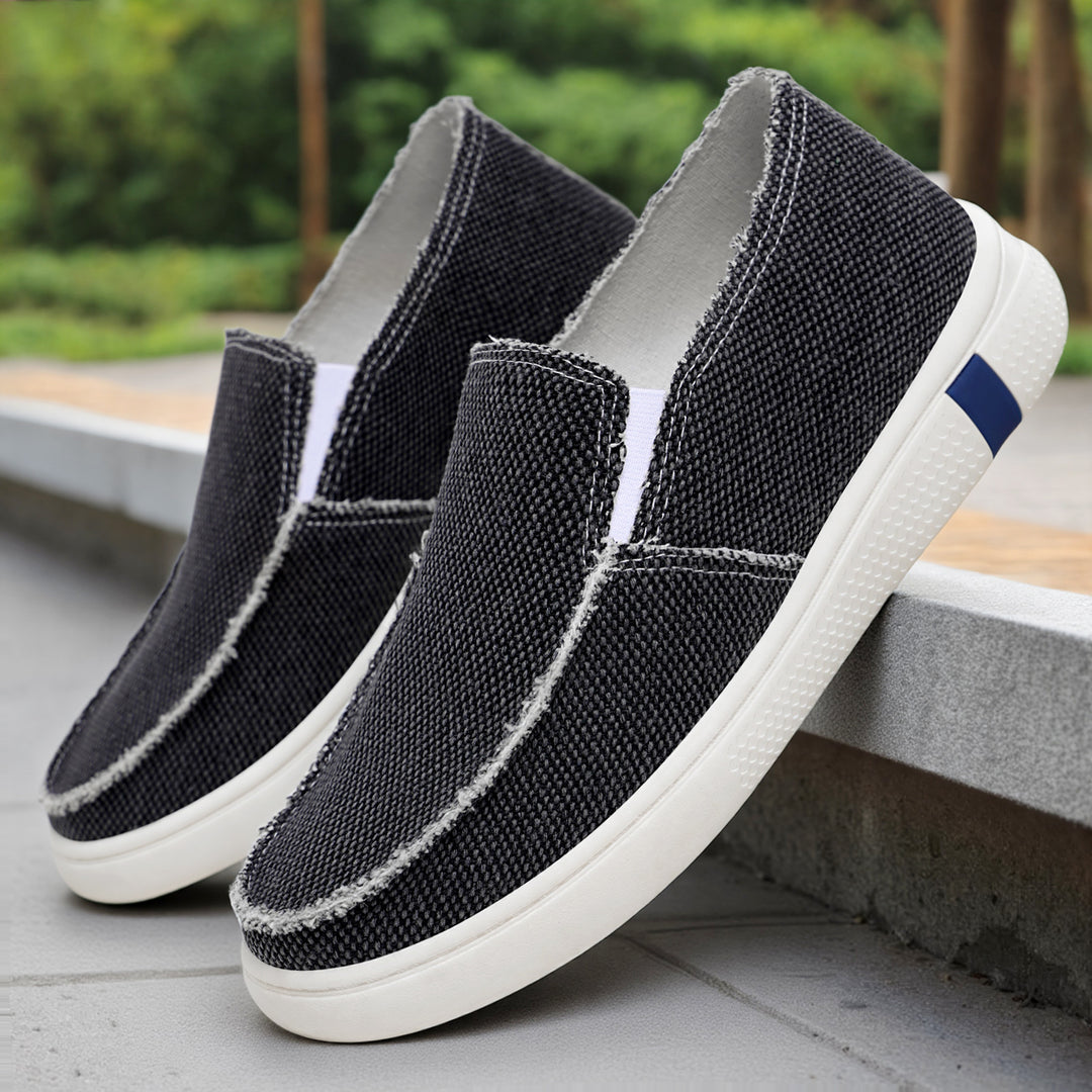 Herren nan lässiger Canvas-Slip-On mit ausgefranster Kante, elastischem Einsatz und griffiger Gummilaufsohle Shop Nory