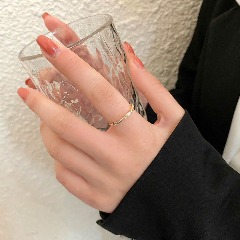 Damen Offener Ring mit elegantem Wellendesign und funkelnden Zirkonia Shop Nory
