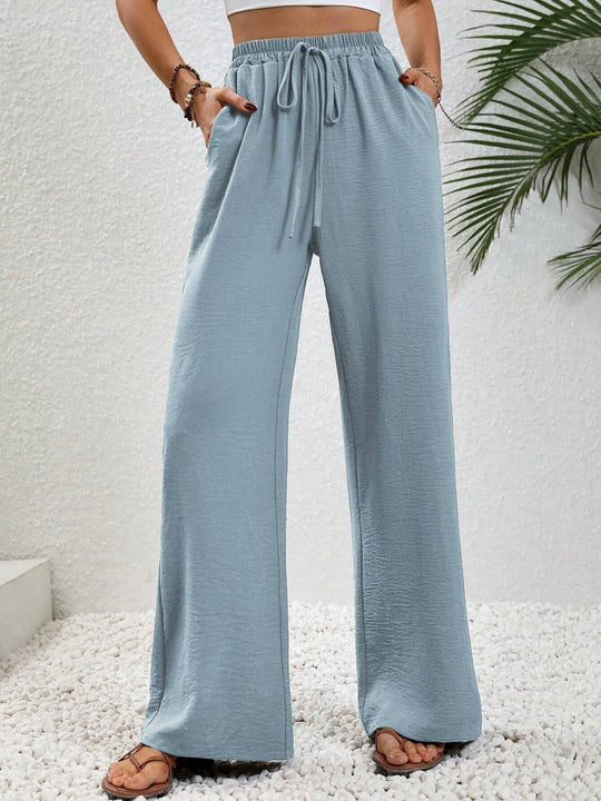 Damen Leichte, weit geschnittene Strandhose mit Elastikbund, Kordelzug und Seitentaschen Shop Nory