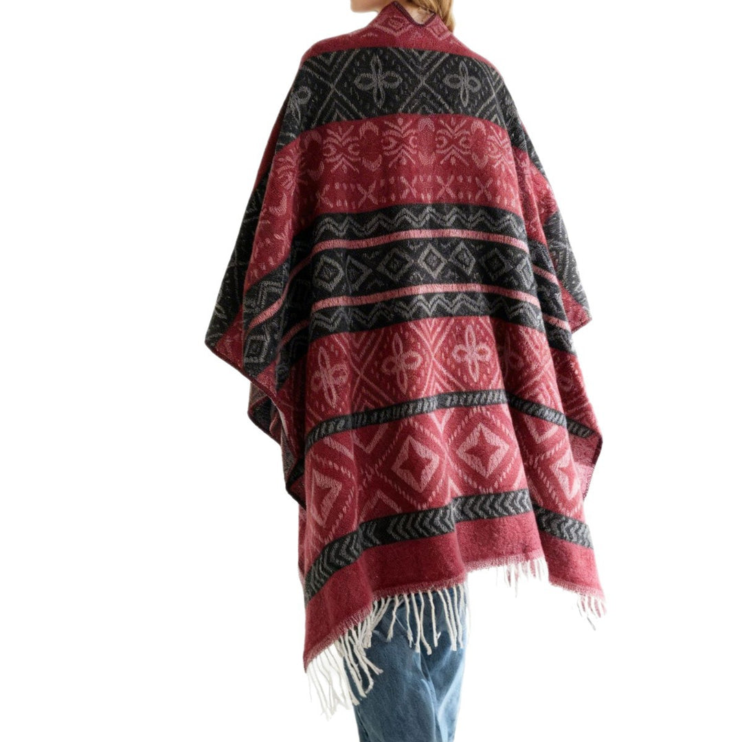 Damen Überwurfcape mit Jacquard‑Strick, V‑Ausschnitt und Fransensaum Shop Nory