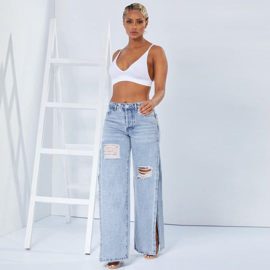 Damen Weite High‑Waist Denim‑Jeans mit hohen Seitenschlitzen und Destroyed‑Details Shop Nory