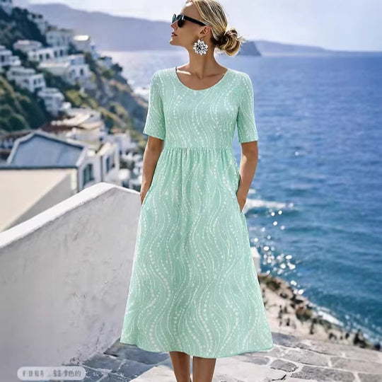 Damen Leichtes Midikleid mit Empire-Taille, halblangen Ärmeln und Eingrifftaschen Shop Nory
