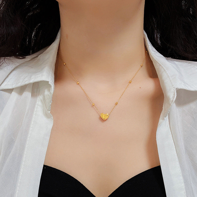 Damen zarte Halskette mit Herzanhänger und goldenen Akzenten Shop Nory
