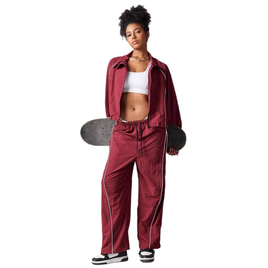Damen sportives Cropped Windbreaker-Set mit Stehkragen Tunnelzug und reflektierenden Paspeln Shop Nory