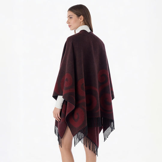 Damen Wollmix-Poncho mit Jacquard‑Wirbelmuster, V-Ausschnitt und Fransen Shop Nory