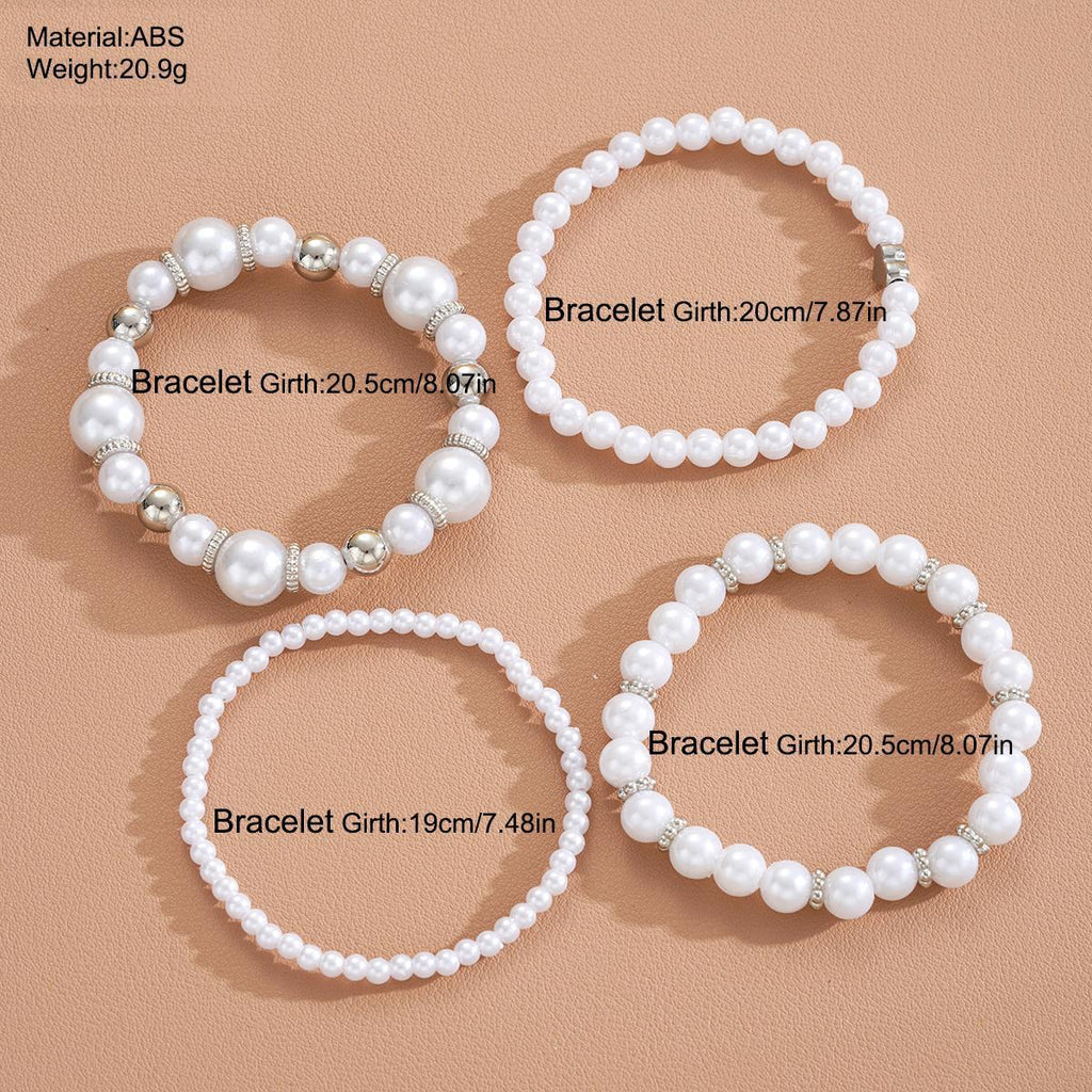 Damen Schmuckarmband-Set mit eleganten Perlen und silbernen Akzenten Shop Nory