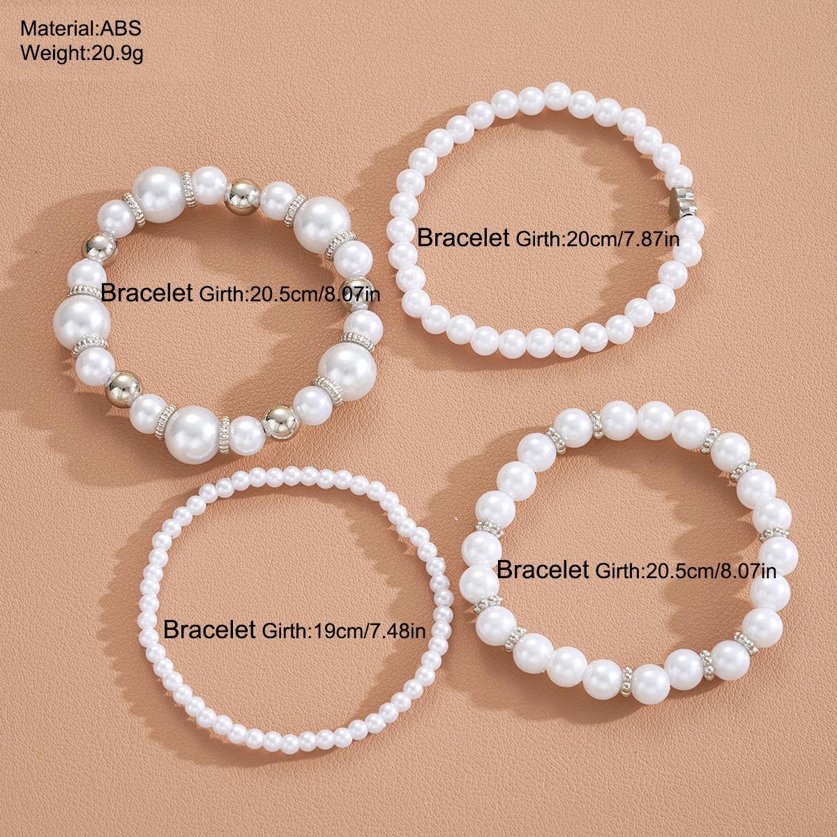 Damen Schmuckarmband-Set mit eleganten Perlen und silbernen Akzenten Shop Nory