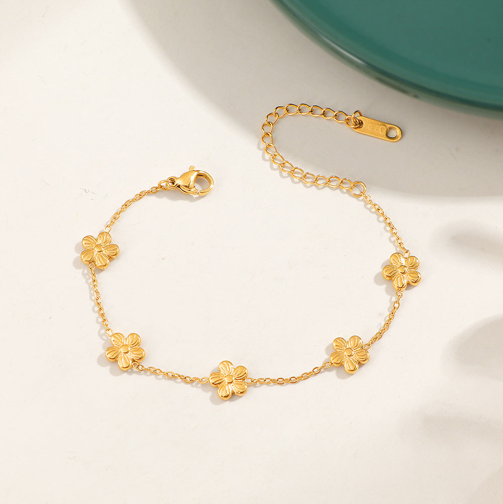 Damen zierliches Armband mit floralen Anhängern Shop Nory