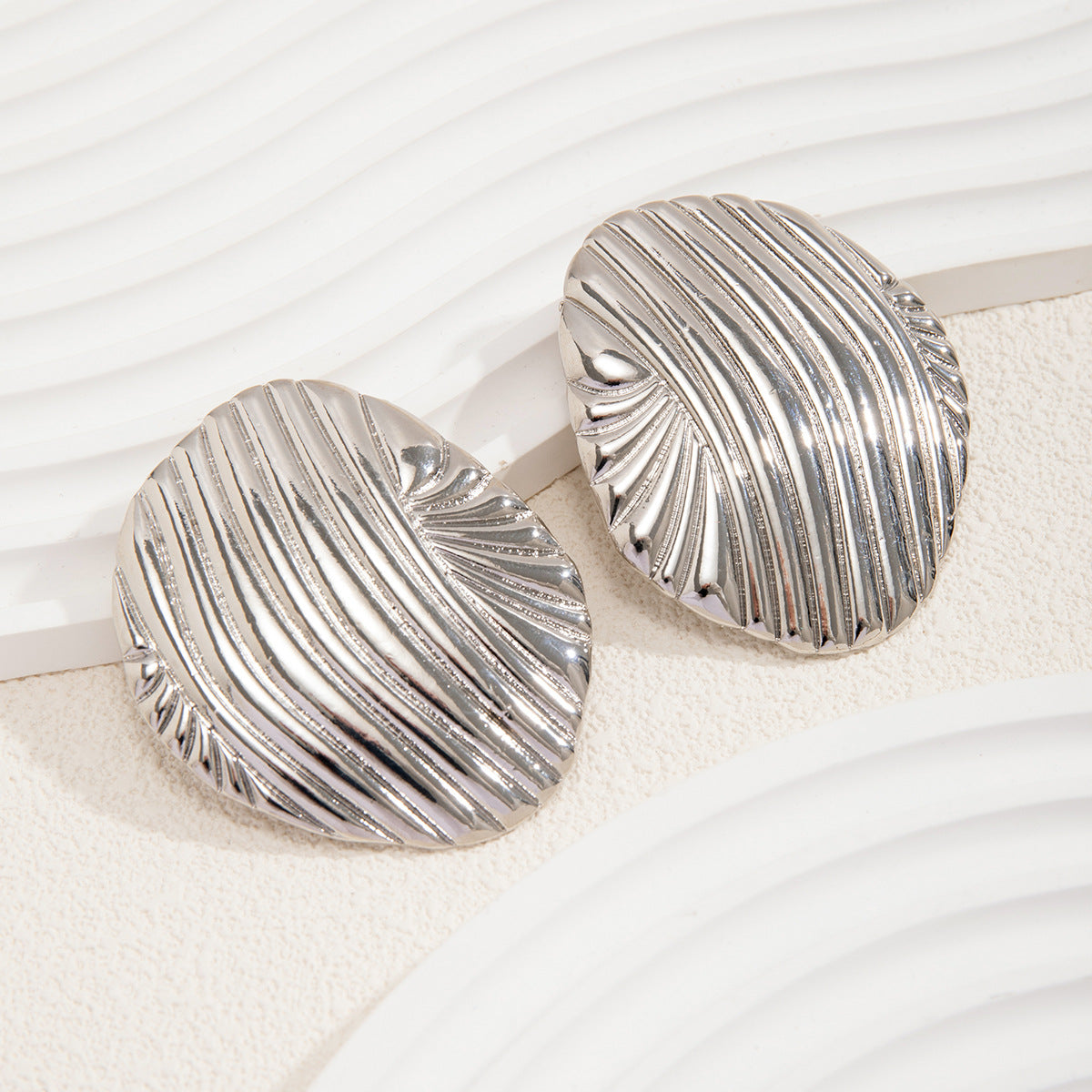 Damen Ohrstecker im eleganten Muschel-Design