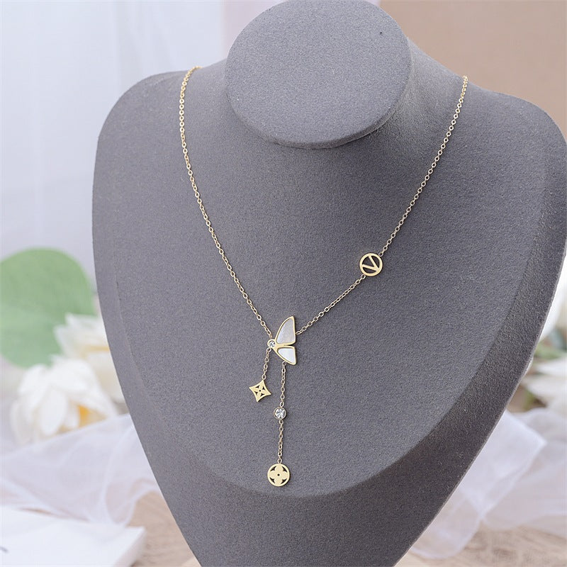 Damen Halskette mit verspieltem Schmetterlingsdesign und funkelnden Akzenten Shop Nory