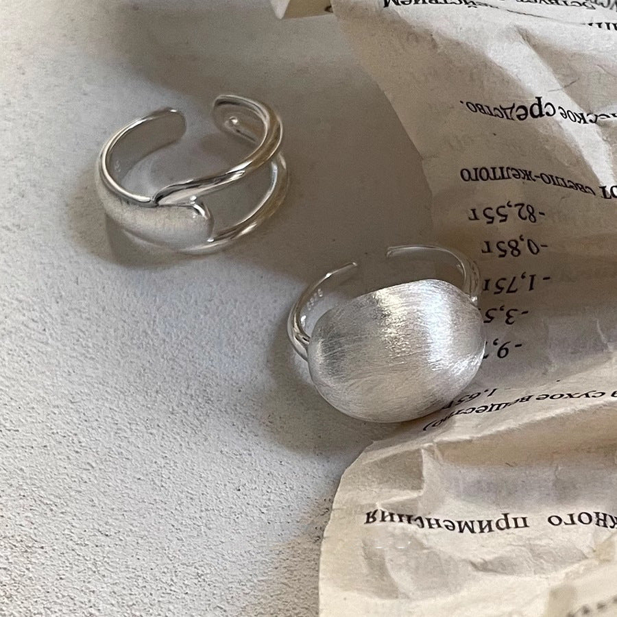 Damenring mit modernem, geschwungenem Design und hochwertiger Oberflächenveredelung Shop Nory