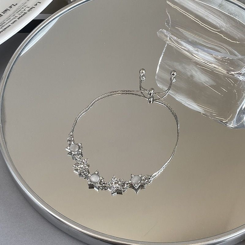 Damen Schlichte Kette mit eleganten Sternanhängern und funkelnden Zirkonia Shop Nory