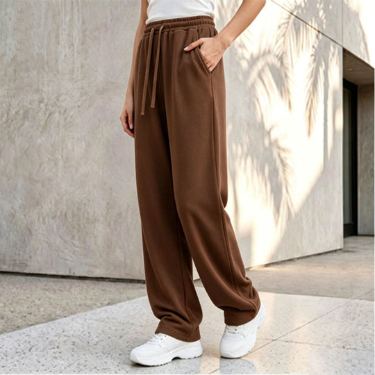 Damen nan weite Loungepalazzo-Hose mit hohem Komfortbund, Kordelzug, seitlichen Eingrifftaschen und dekorativer Seitennaht Shop Nory