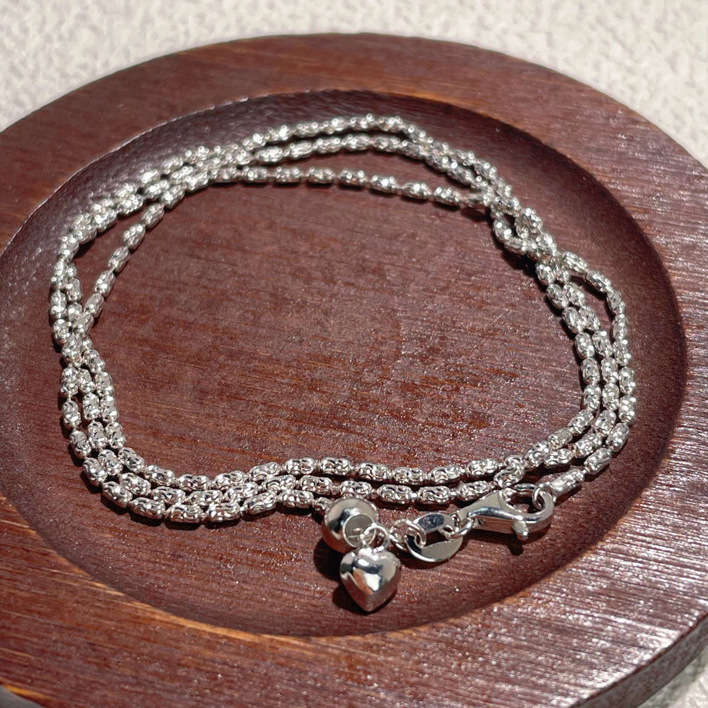 Damen Halskette mit funkelnden Herzanhängern und klassischen Gliederketten Shop Nory