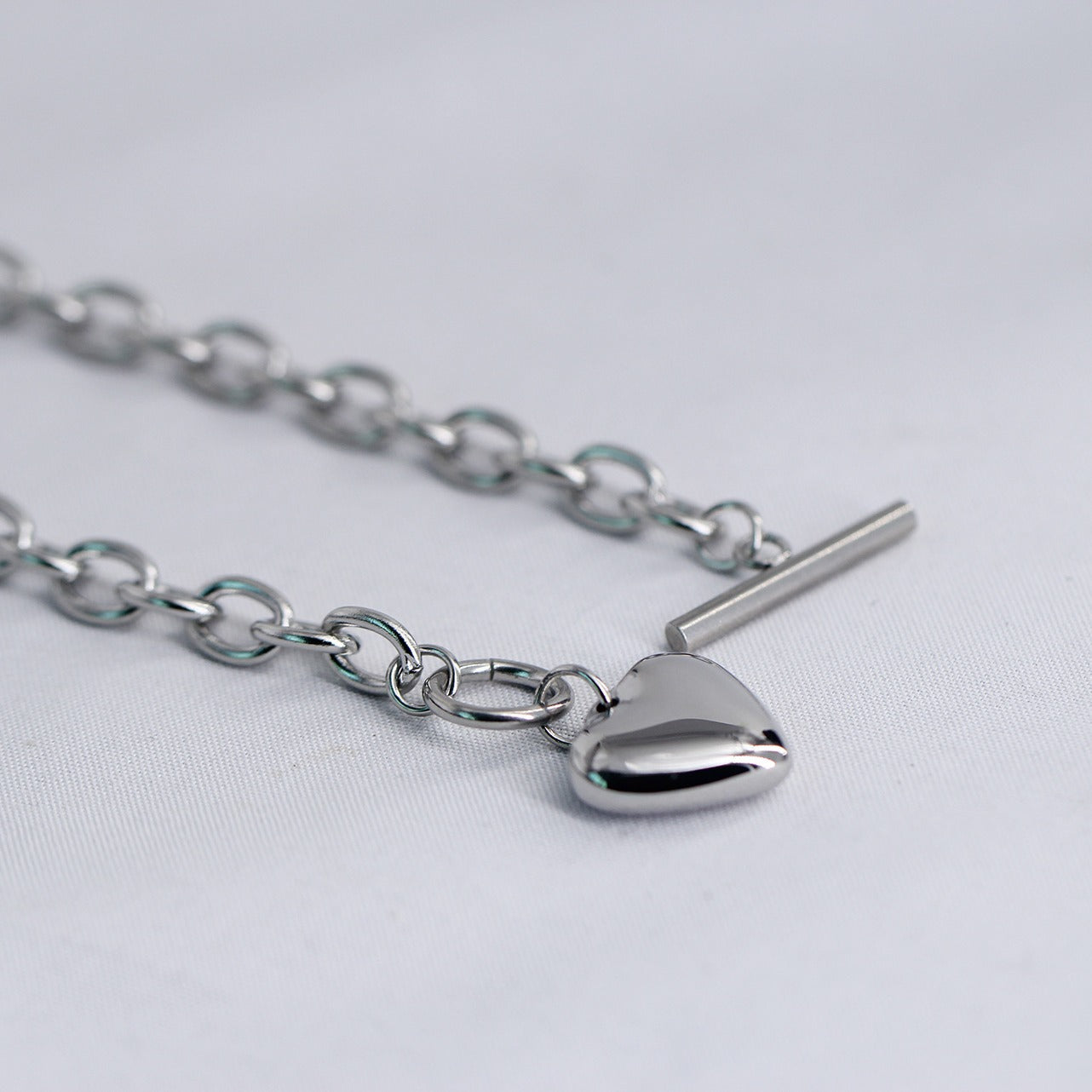 Damen Armband mit herzförmigem Charm und massiven Gliederketten Shop Nory