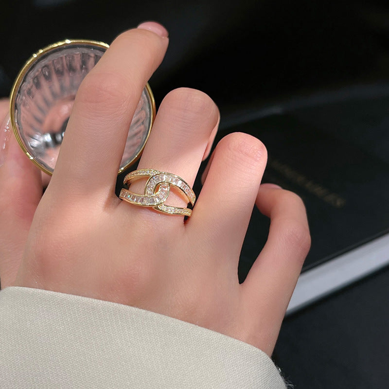 Damen Offener Ring mit kunstvollem Zirkonia-Besatz und glänzendem Goldfinish Shop Nory