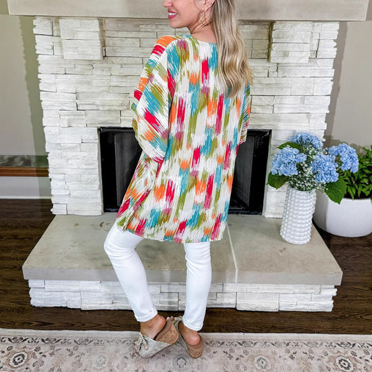 Damen Oversized V‑Neck Tunika im Plissee‑Look mit abstraktem Ikat‑Print Shop Nory