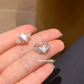 Damen Ring mit funkelndem Stern und eleganten Ziersteinen Shop Nory