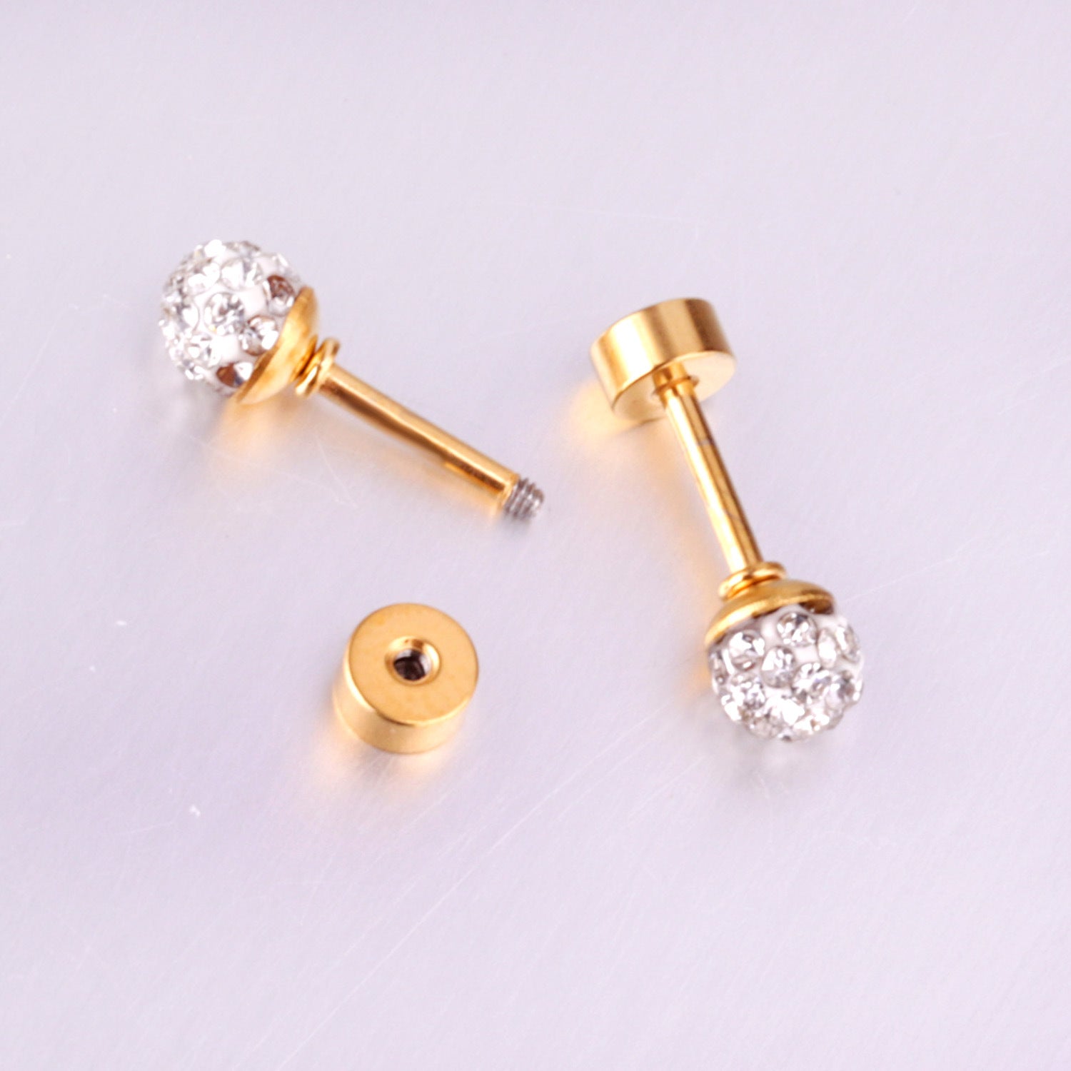 Damen Ohrstecker aus Edelstahl mit funkelnden Zirkonia Shop Nory
