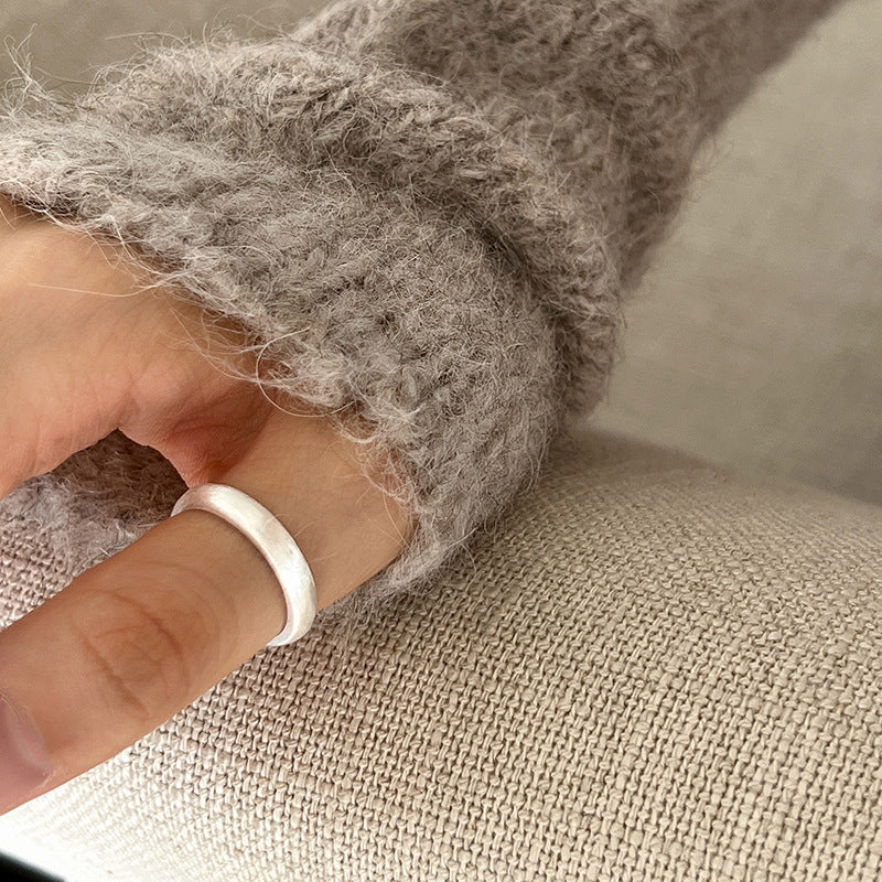 Damenring aus hochwertigem Edelstahl mit modernem, geschwungenem Design Shop Nory