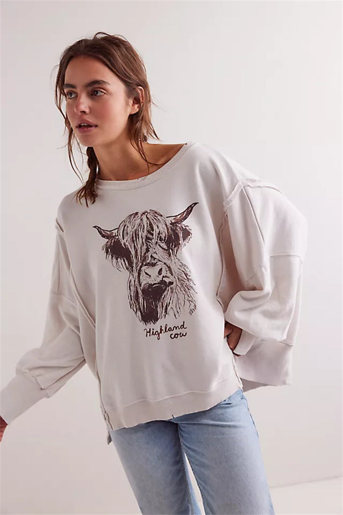 Damen oversized Sweatshirt mit Rüben-Print, ausgefransten Nahtakzenten und Daumenlochärmeln Shop Nory