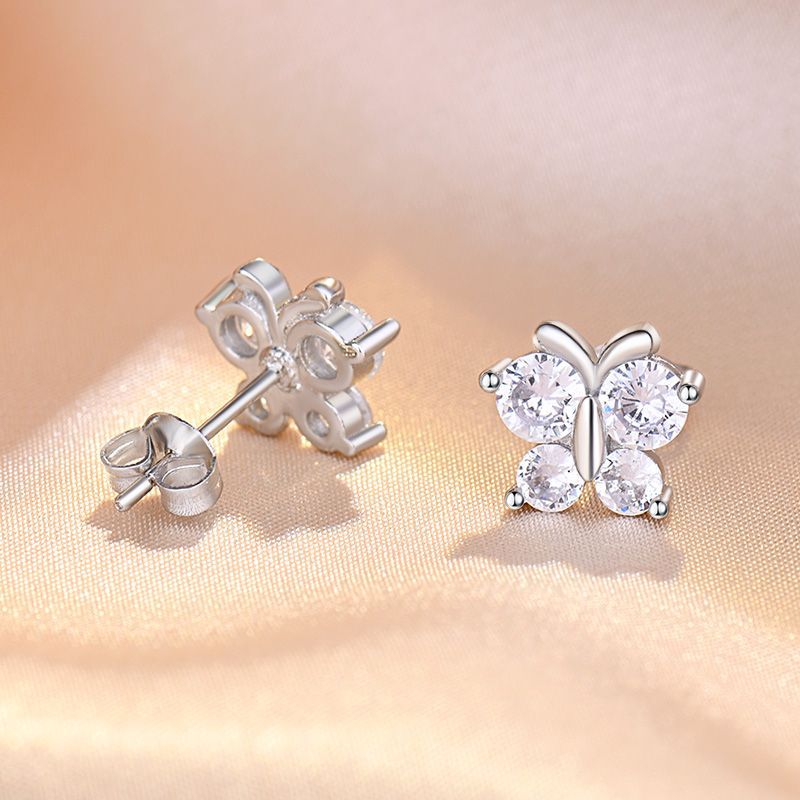 Damen Ohrstecker im eleganten Schmetterlingsdesign mit funkelnden Zirkonia Shop Nory