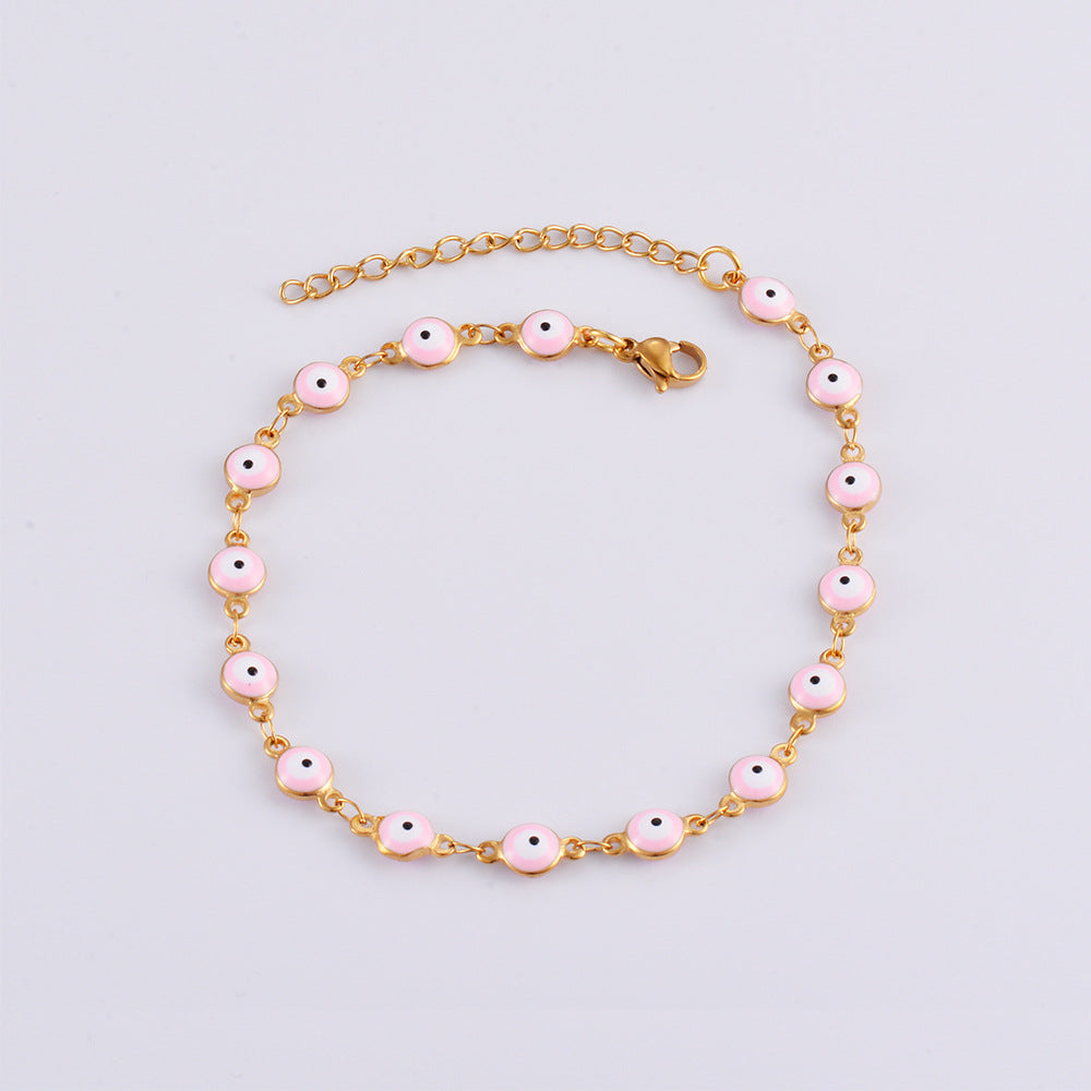 Damen Armband mit schützenden Augenmotiven und feinem Goldglanz Shop Nory